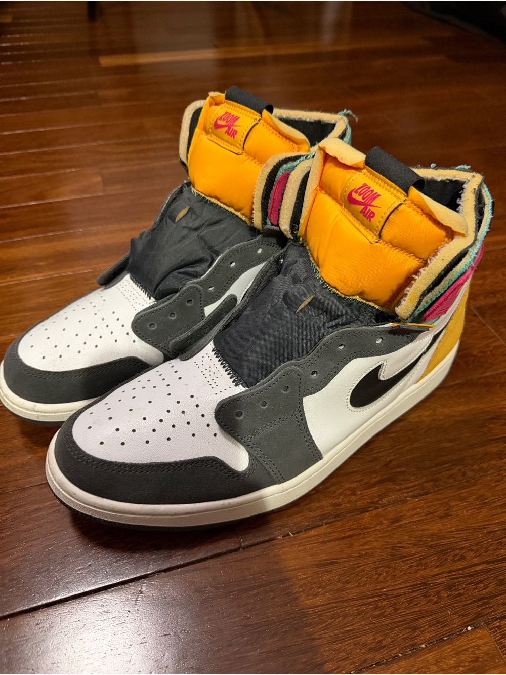 Jordan High-Top Sneakers in White, Black & Yellow with Pink Accents